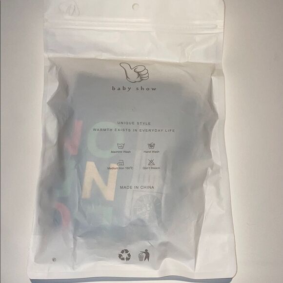 Two baby hats and an unopened baby onesie - Picture 4 of 6